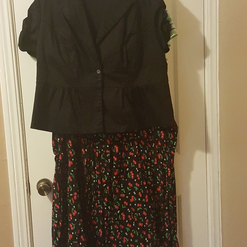 Black blazer, cherry print skirt and red heels.